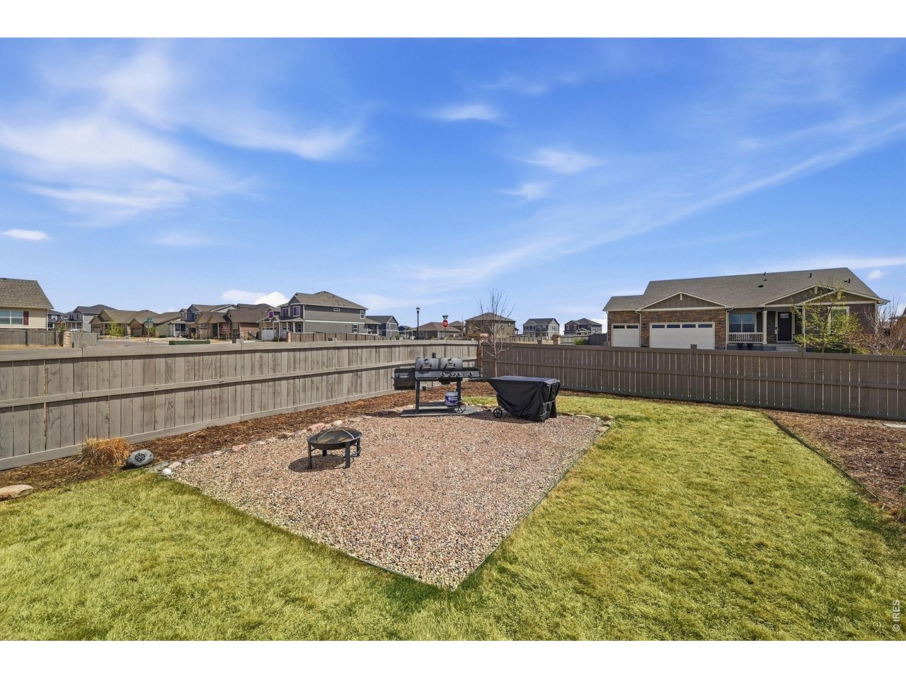 1699 Rivergate Way Berthoud, CO 80513 - Photo 31 of 45 a view of a swimming pool with an outdoor seating