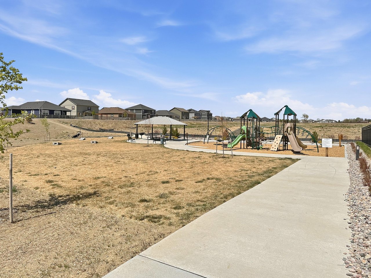 1699 Rivergate Way Berthoud, CO 80513 - Photo 36 of 45 a view of swimming pool with a yard