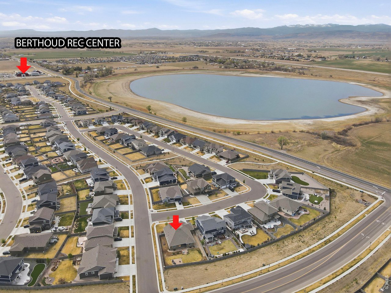 1699 Rivergate Way Berthoud, CO 80513 - Photo 44 of 45 a view of swimming pool with a table and chairs