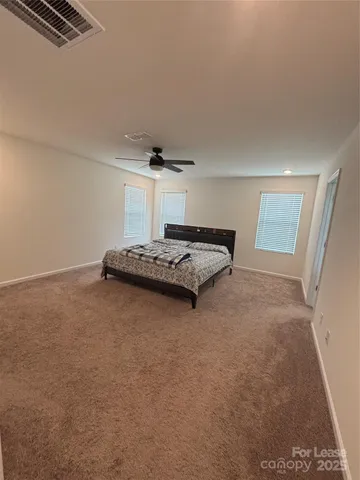 a bath room with a bath tub and a shower