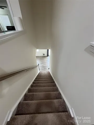 a view of a room with natural light