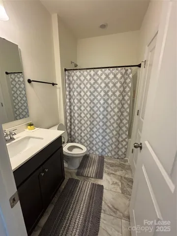 a room with a rug and a stove