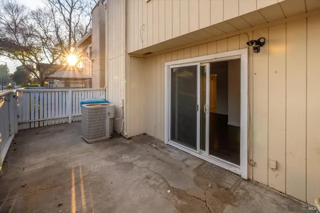 an outdoor sitting area with a couch