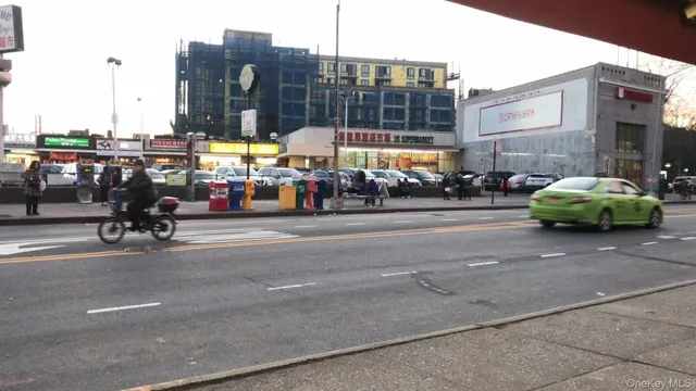 a view of a street with cars