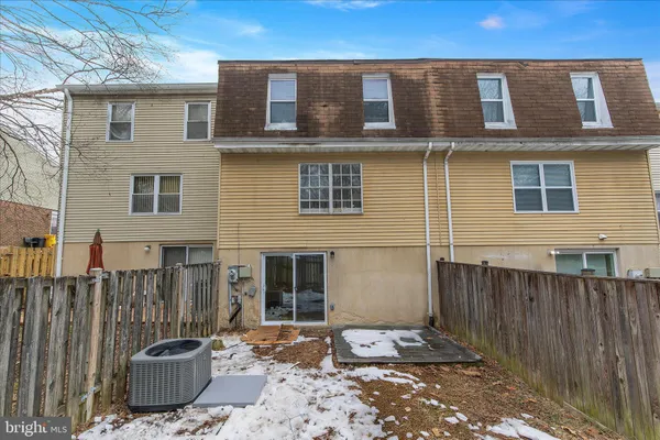 a view of balcony with wooden floor