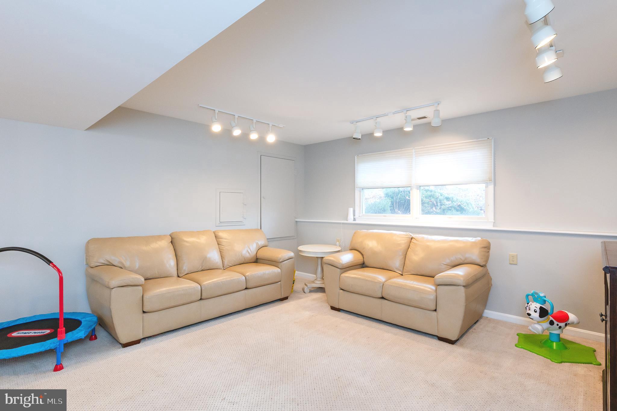308 Cree Terrace Rising Sun, MD 21911 - Photo 37 of 51 a living room with furniture and a large window