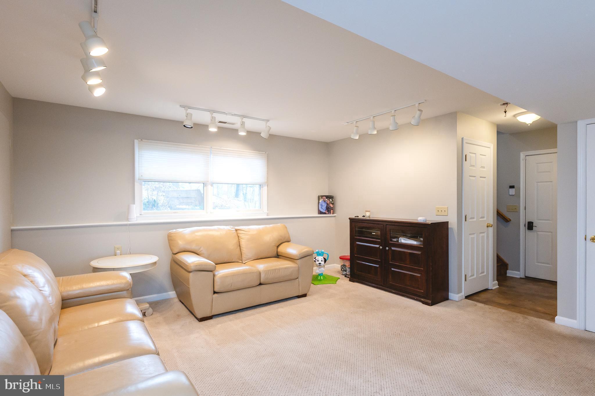 308 Cree Terrace Rising Sun, MD 21911 - Photo 39 of 51 a living room with furniture and a window