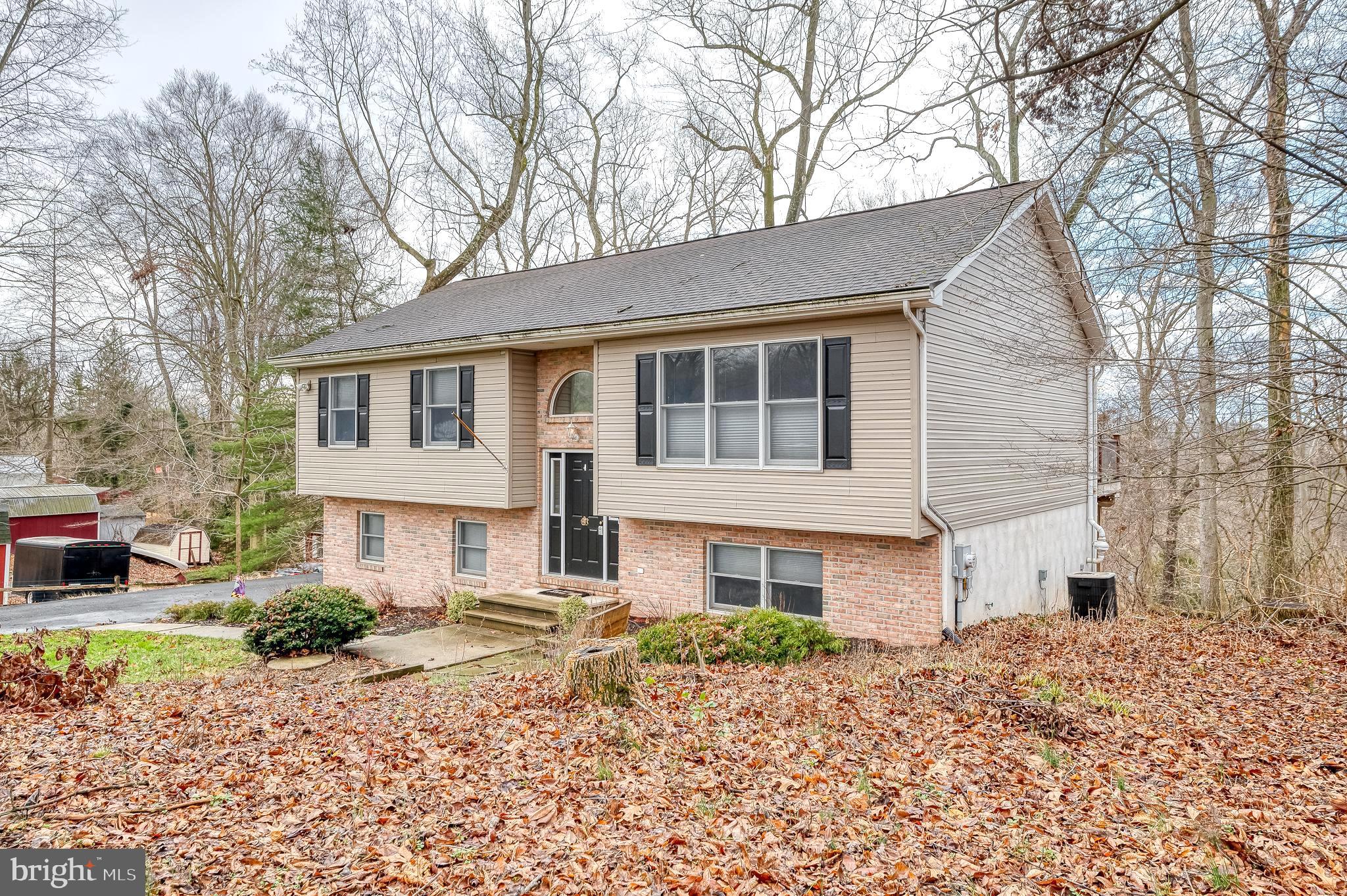 308 Cree Terrace Rising Sun, MD 21911 - Photo 5 of 51 a front view of a house with a yard