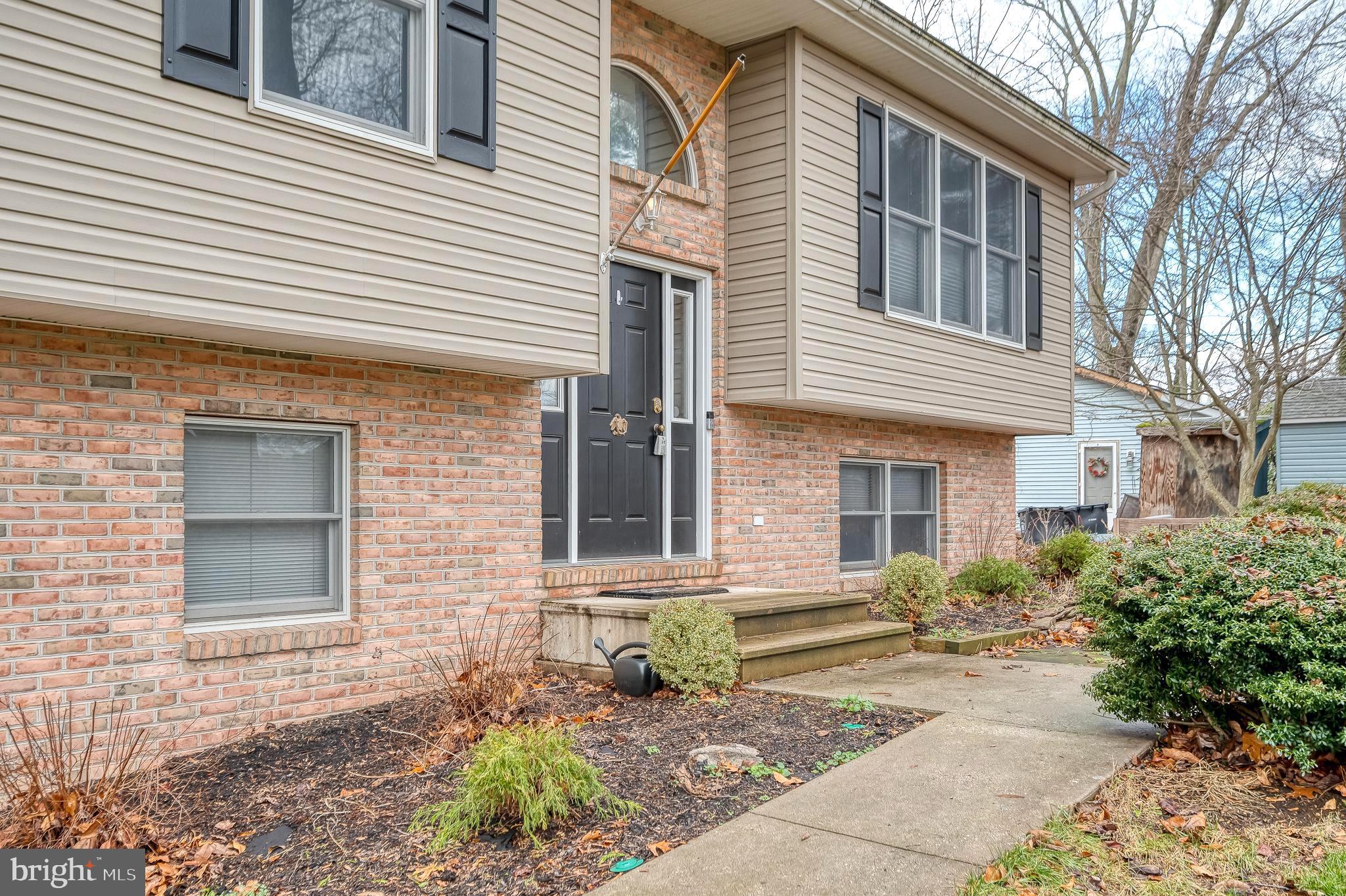308 Cree Terrace Rising Sun, MD 21911 - Photo 6 of 51 a front view of a house with garden