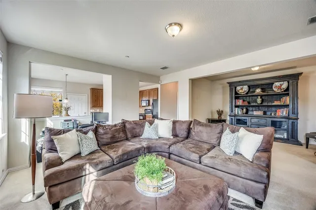 a view of a workspace with furniture