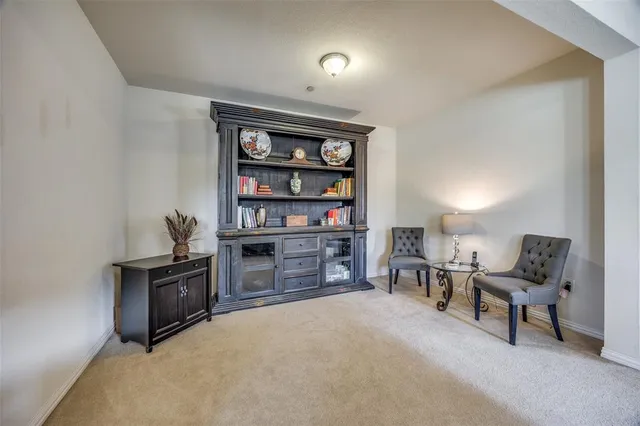 a kitchen with stainless steel appliances granite countertop a stove sink and cabinets