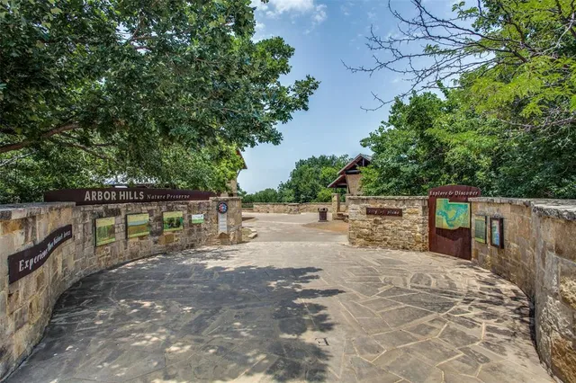 a view of balcony and yard