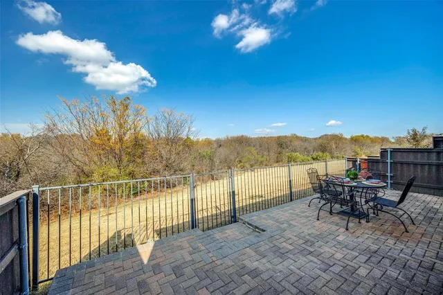 a view of a terrace with furniture