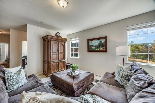 a living room with furniture and a couch