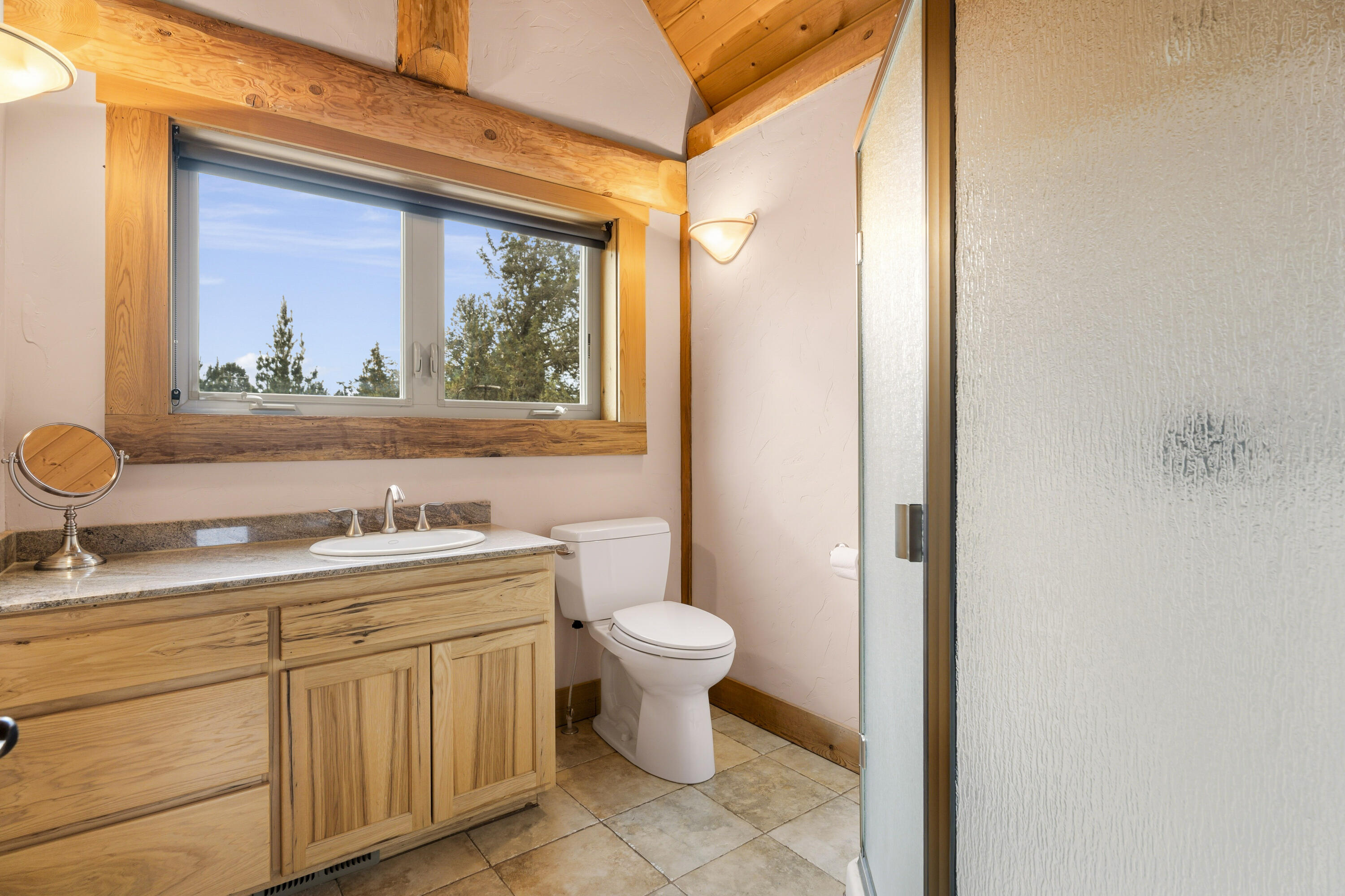 10739 Southwest Shad Road Terrebonne, OR 97760 - Photo 51 of 55 a bathroom with a toilet sink and mirror