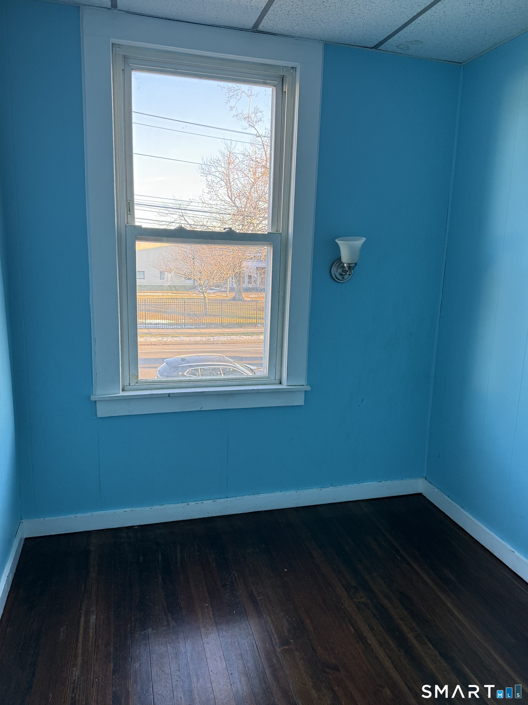 1566 North Avenue Bridgeport, CT 06604 - Photo 6 of 10 a small space with wooden floor and a window