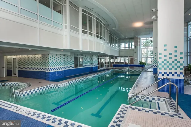 a view of a swimming pool with a garden