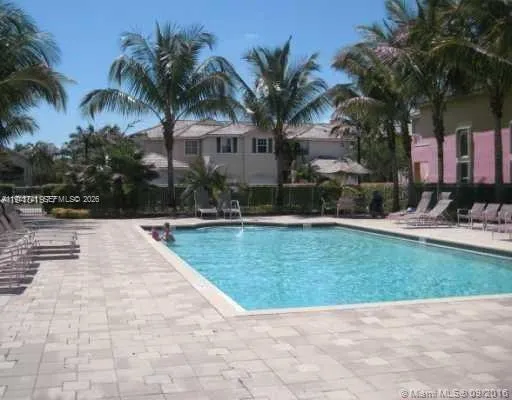 a view of outdoor space yard and swimming pool