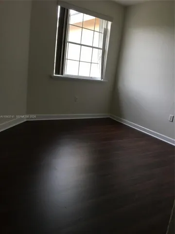 a bathroom with a bathtub and a sink