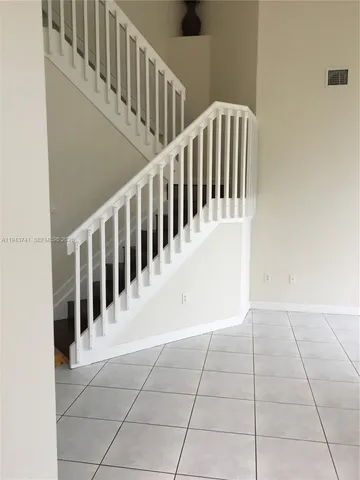 a view of an entryway with staircase