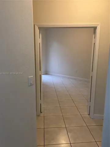 a bathroom with a sink a mirror and a bathtub
