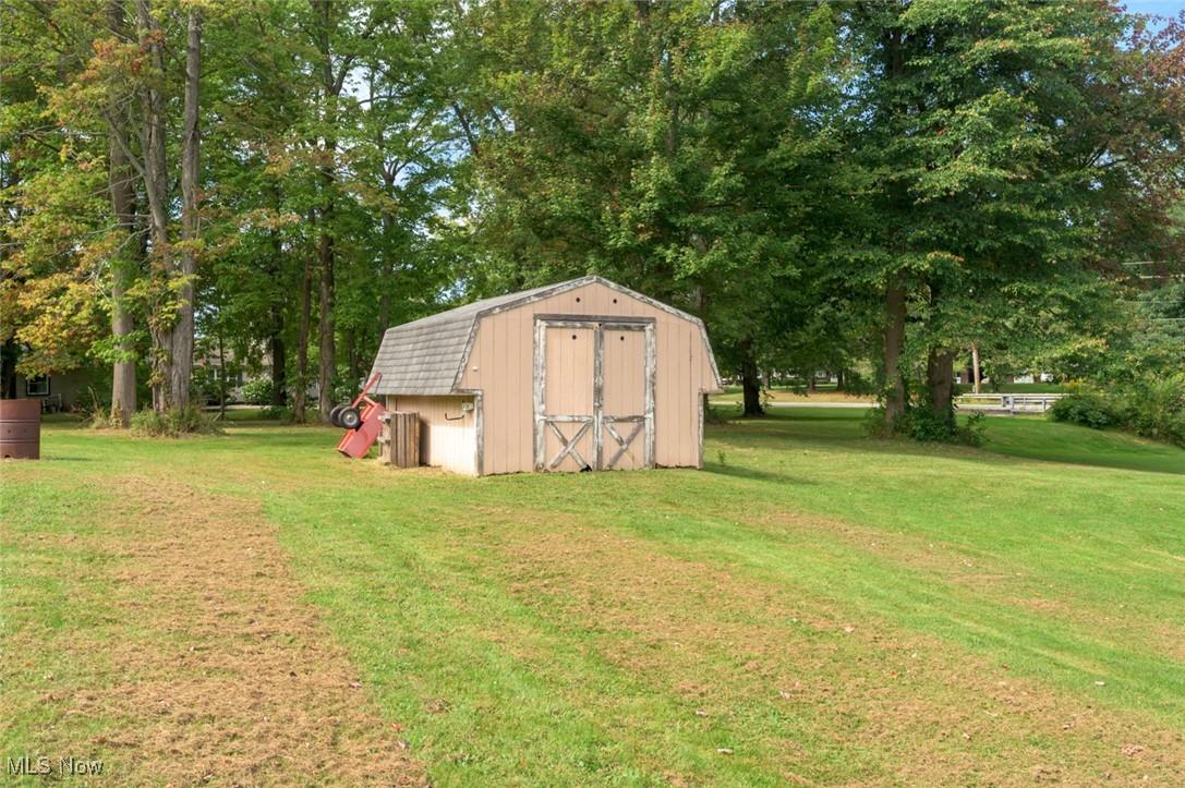 3738 South Ridge Road East Ashtabula, OH 44004 - Photo 12 of 41 View of yard featuring a shed
