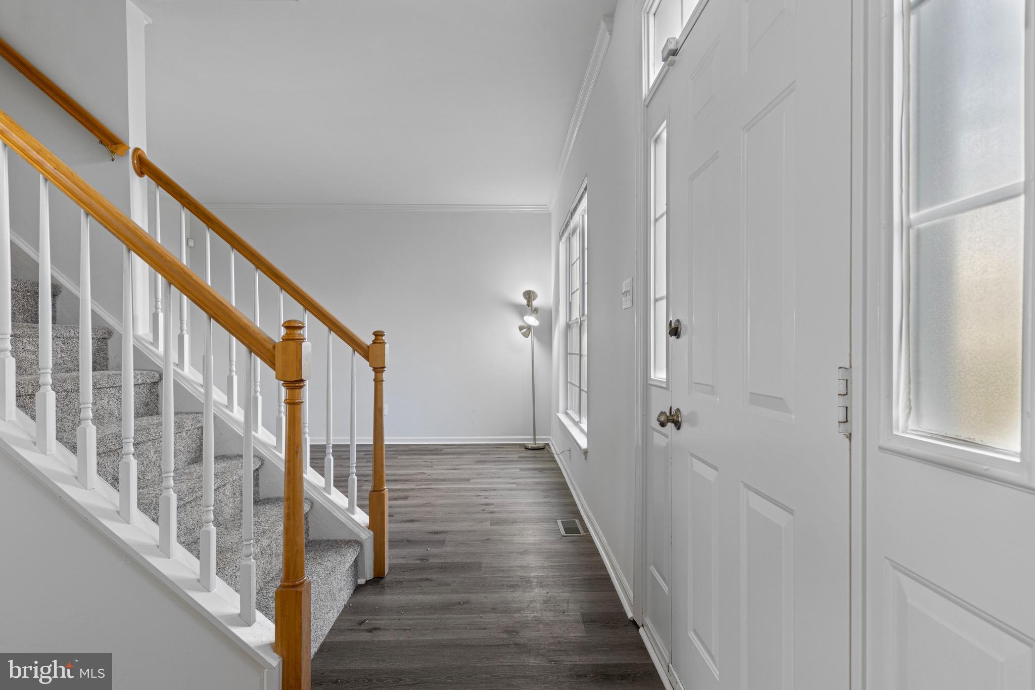 360 Yorklyn Road Oxford, PA 19363 - Photo 14 of 54 a view of a hallway with wooden floor and staircase