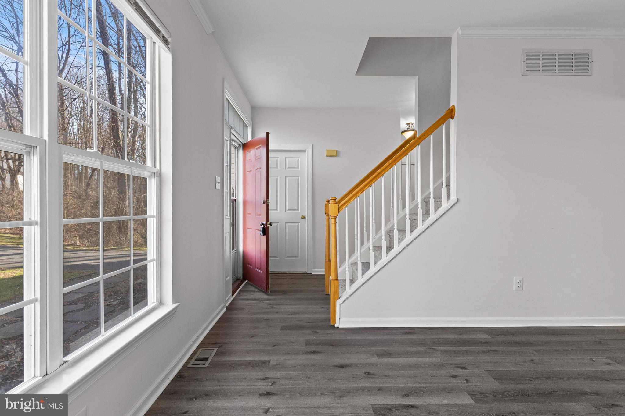 360 Yorklyn Road Oxford, PA 19363 - Photo 15 of 54 a view of an entryway with wooden floor and windows