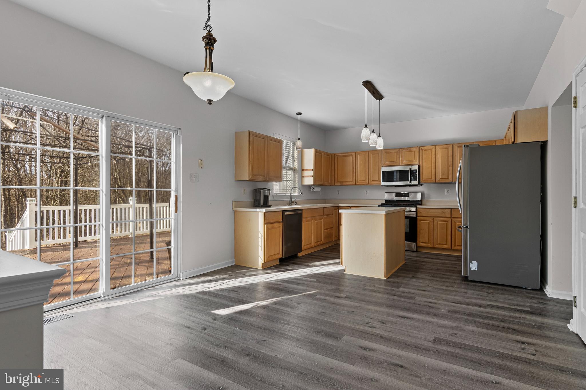 360 Yorklyn Road Oxford, PA 19363 - Photo 22 of 54 a kitchen with stainless steel appliances granite countertop a refrigerator a stove top oven a sink and dishwasher