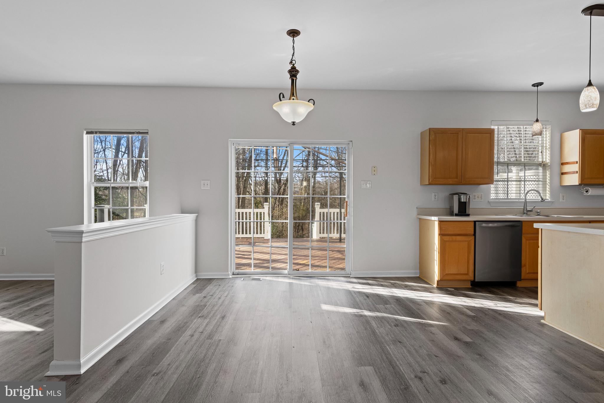 360 Yorklyn Road Oxford, PA 19363 - Photo 23 of 54 a view of an empty room with a window and wooden floor
