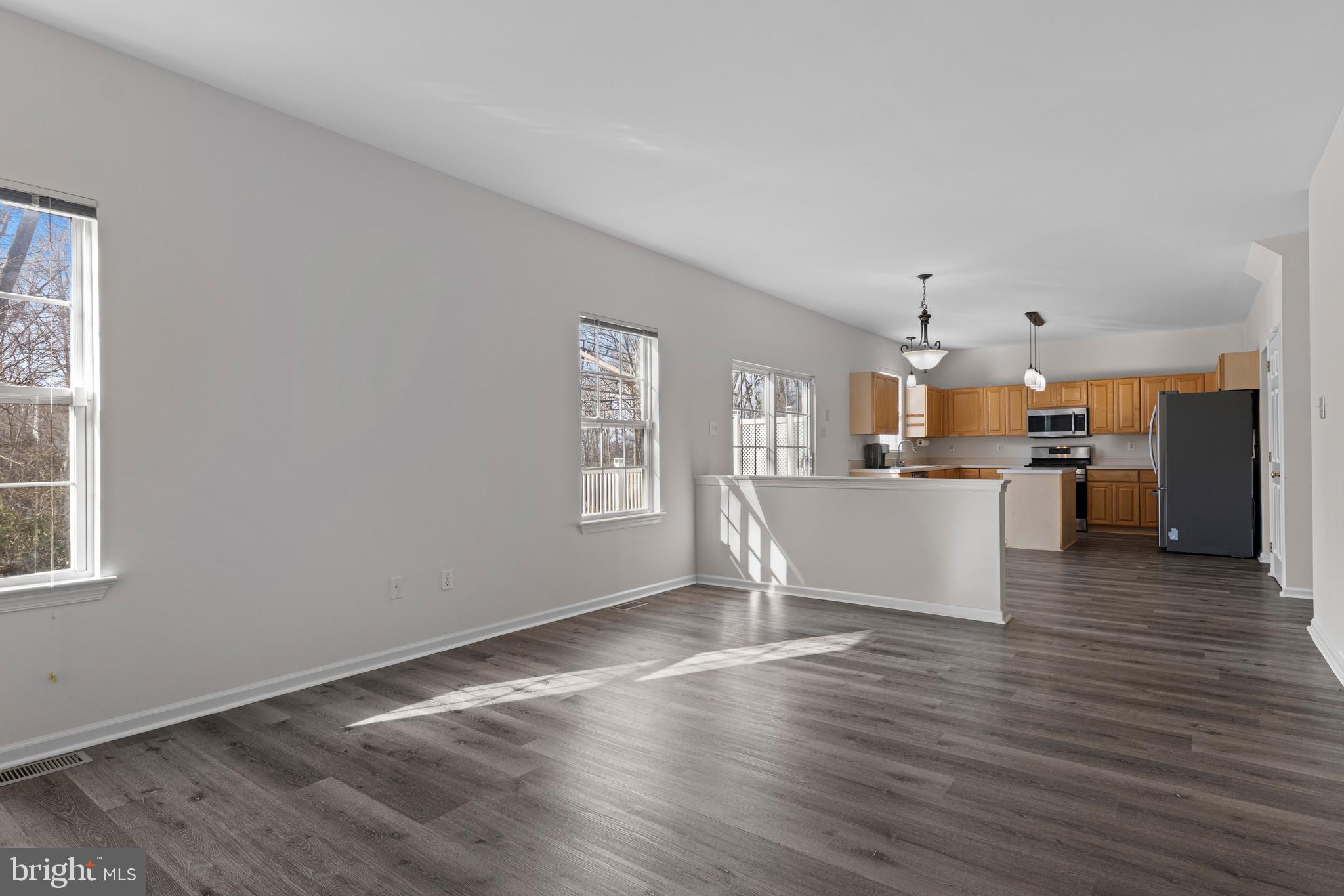 360 Yorklyn Road Oxford, PA 19363 - Photo 26 of 54 a living room with stainless steel appliances kitchen island wooden floor and view living room