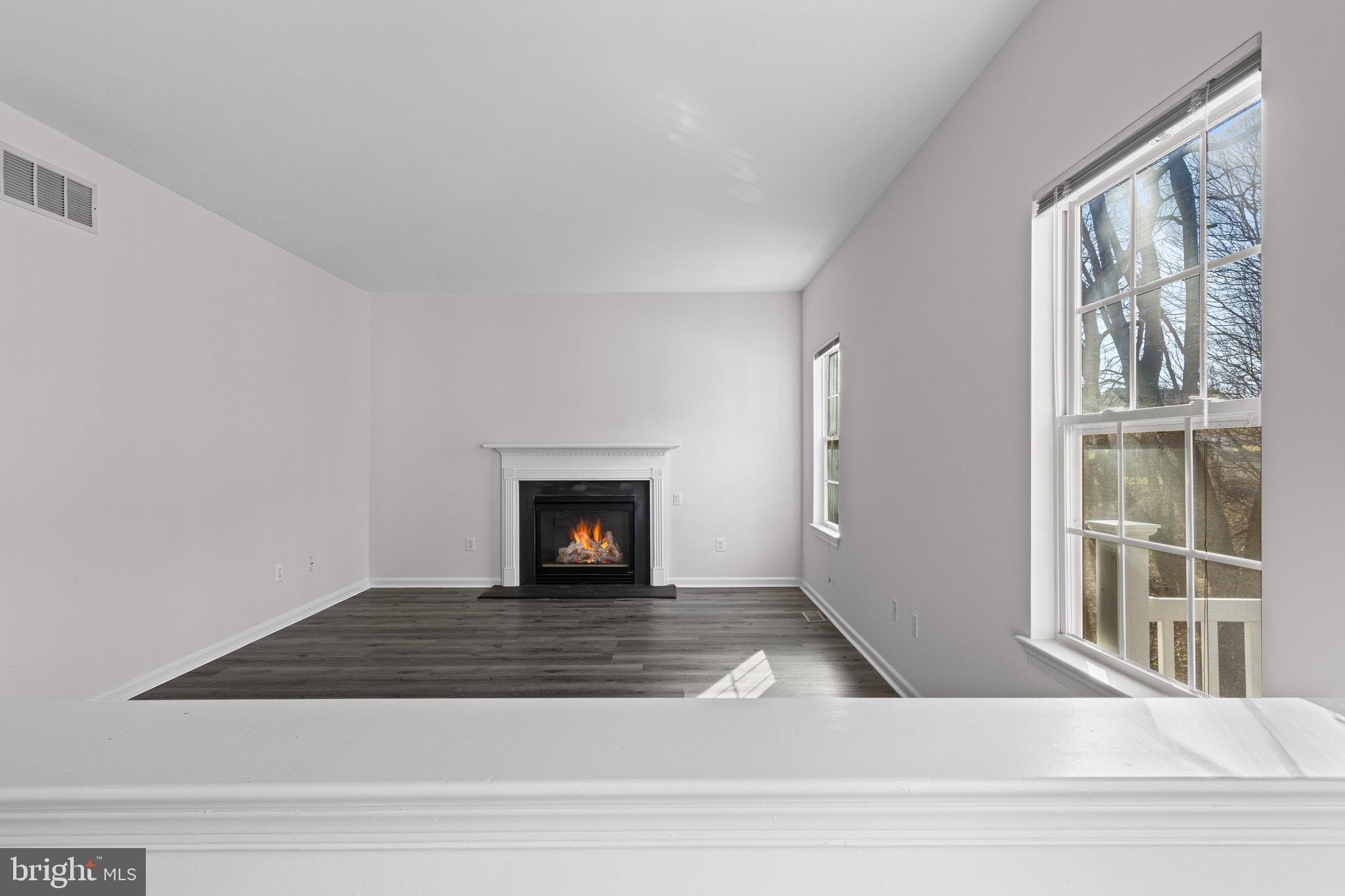 360 Yorklyn Road Oxford, PA 19363 - Photo 28 of 54 a view of an empty room with wooden floor and a window