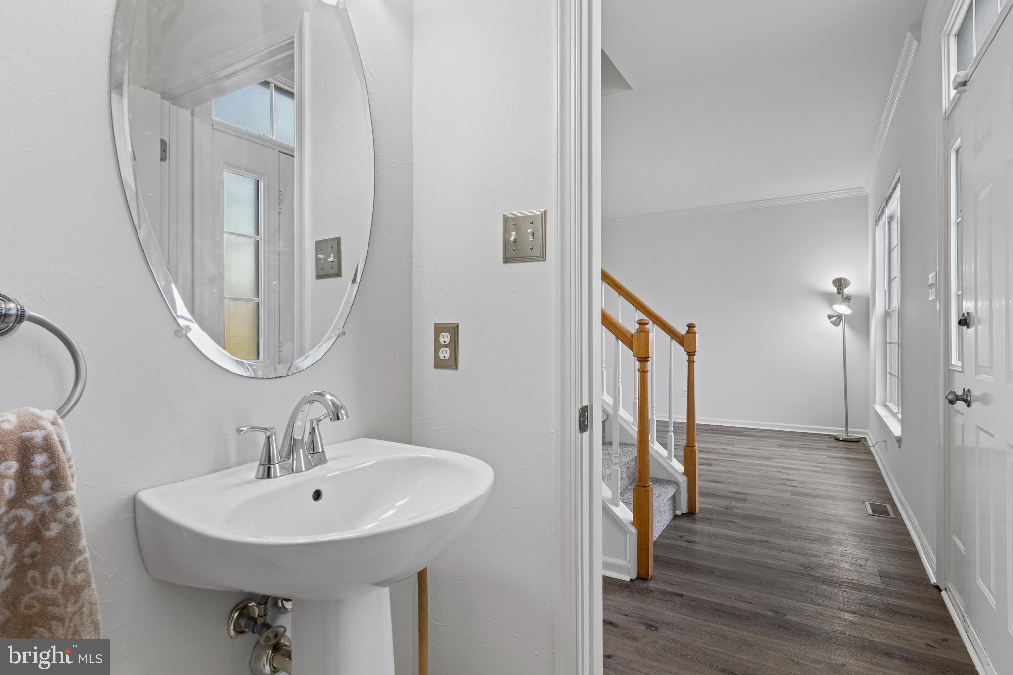 360 Yorklyn Road Oxford, PA 19363 - Photo 29 of 54 a bathroom with a sink a mirror a vanity and shower