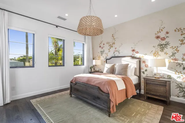 a bathroom with a granite countertop sink a toilet and bathtub