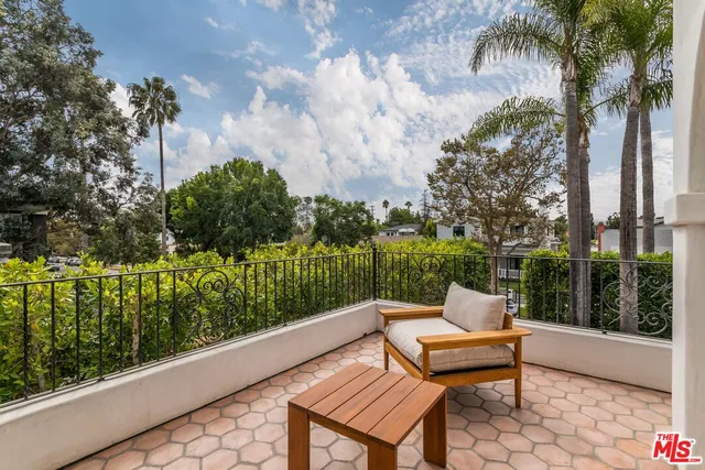 a bathroom with a sink double vanity and a mirror