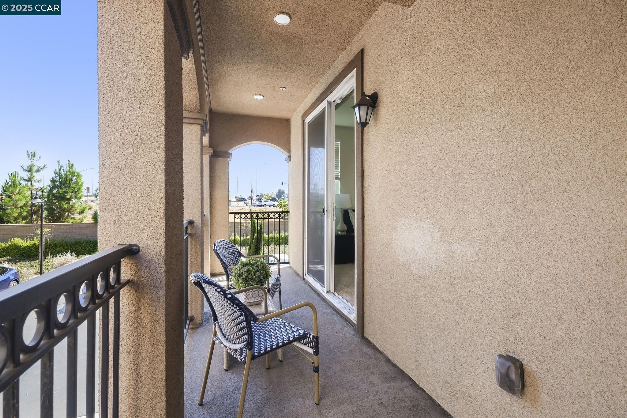 38976 Primula Terrace Newark, CA 94560 - Photo 14 of 29 a view of a hallway with wooden floor and windows