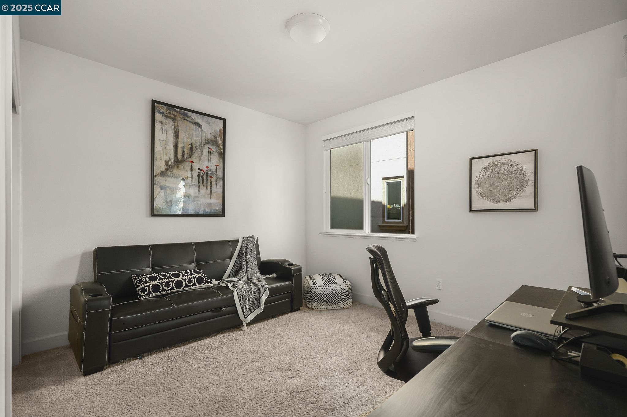 38976 Primula Terrace Newark, CA 94560 - Photo 19 of 29 a living room with furniture a piano and a flat screen tv