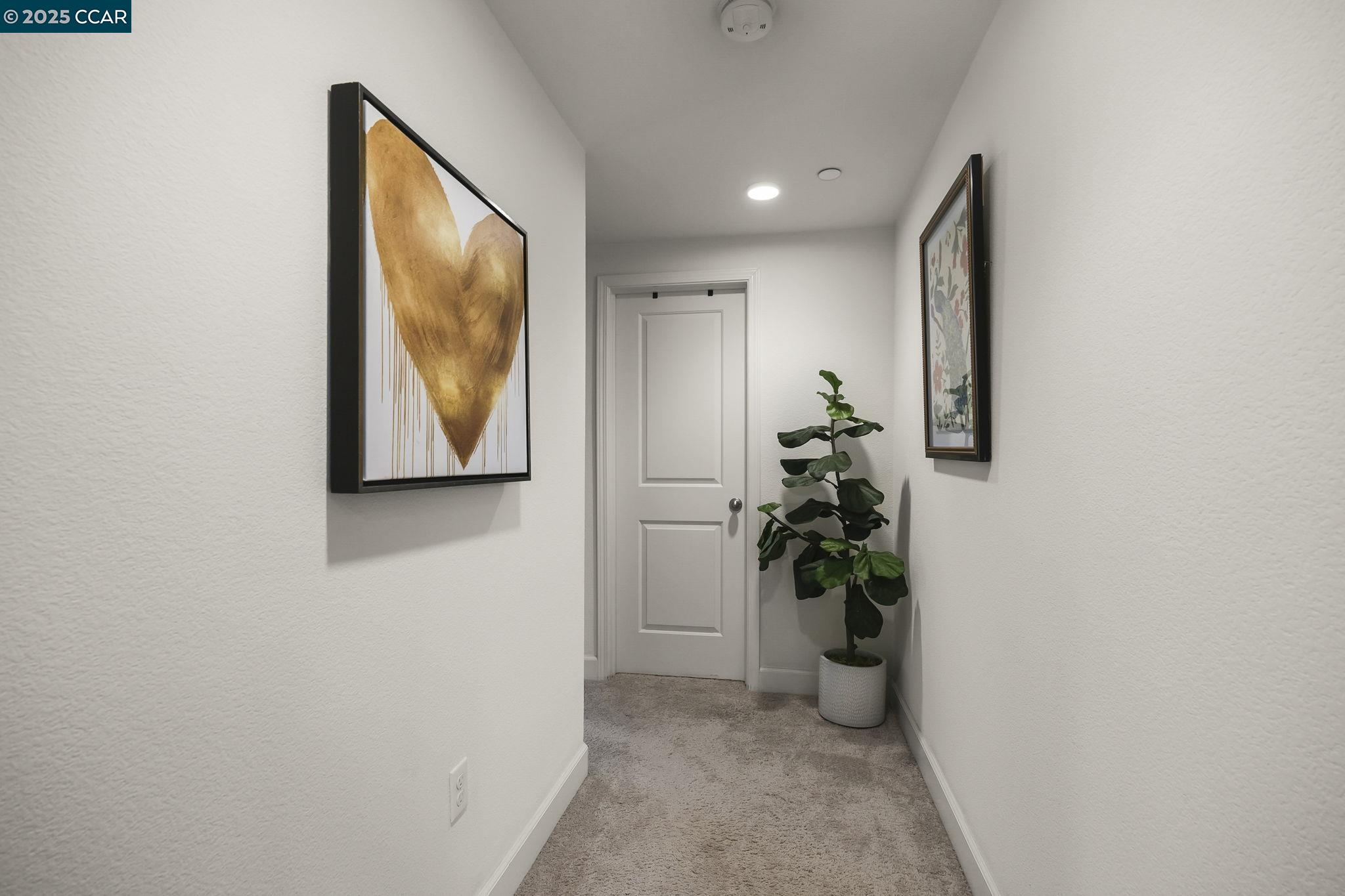 38976 Primula Terrace Newark, CA 94560 - Photo 21 of 29 a view of a hallway with potted plants