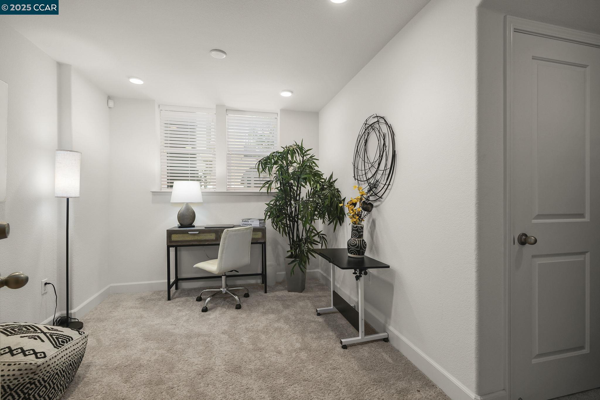 38976 Primula Terrace Newark, CA 94560 - Photo 24 of 29 a view of a workspace with furniture