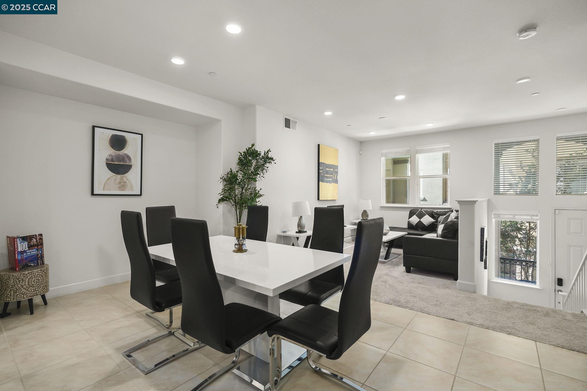 38976 Primula Terrace Newark, CA 94560 - Photo 6 of 29 a view of a dining room with furniture