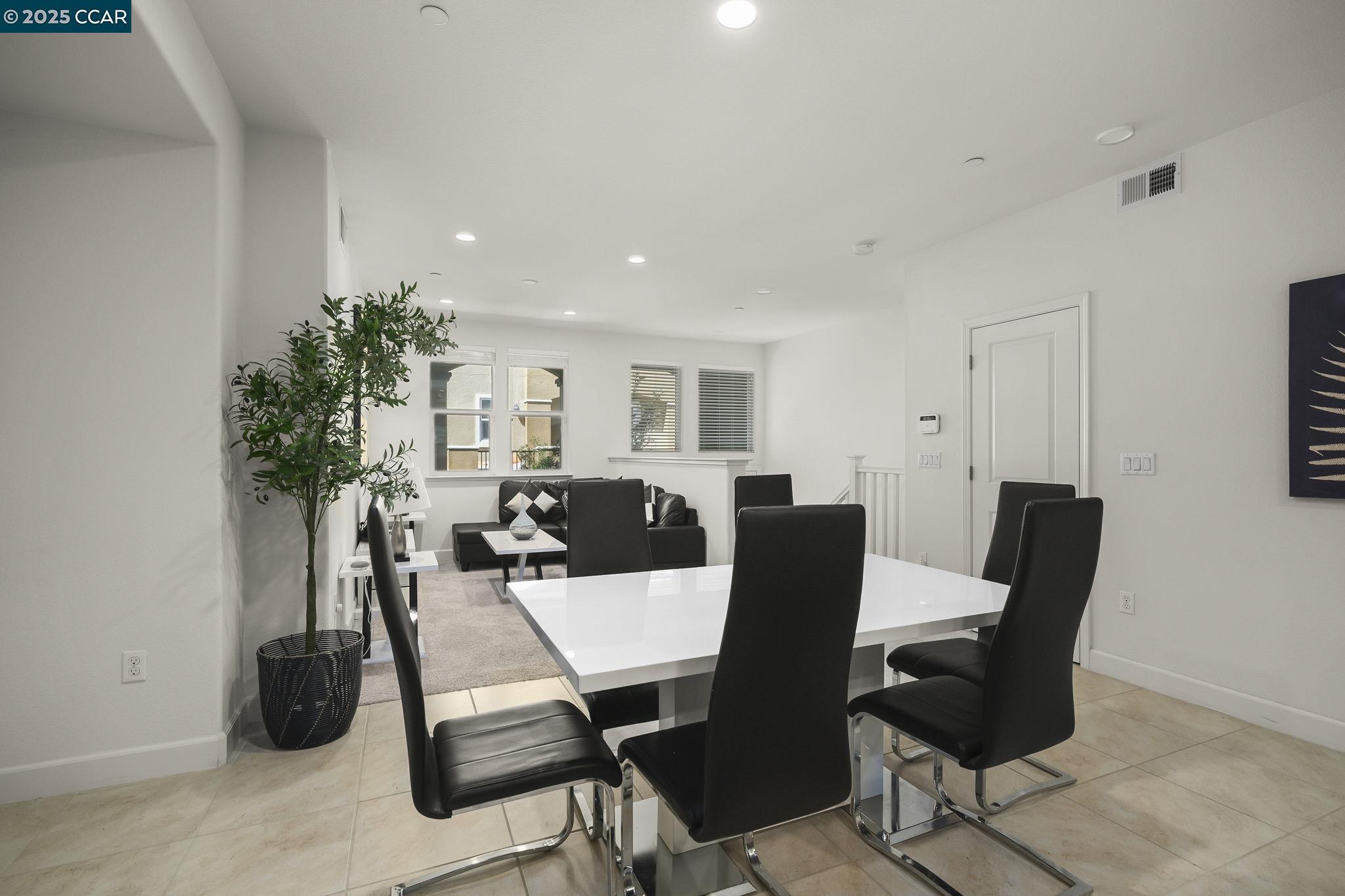 38976 Primula Terrace Newark, CA 94560 - Photo 7 of 29 a view of a dining room with furniture