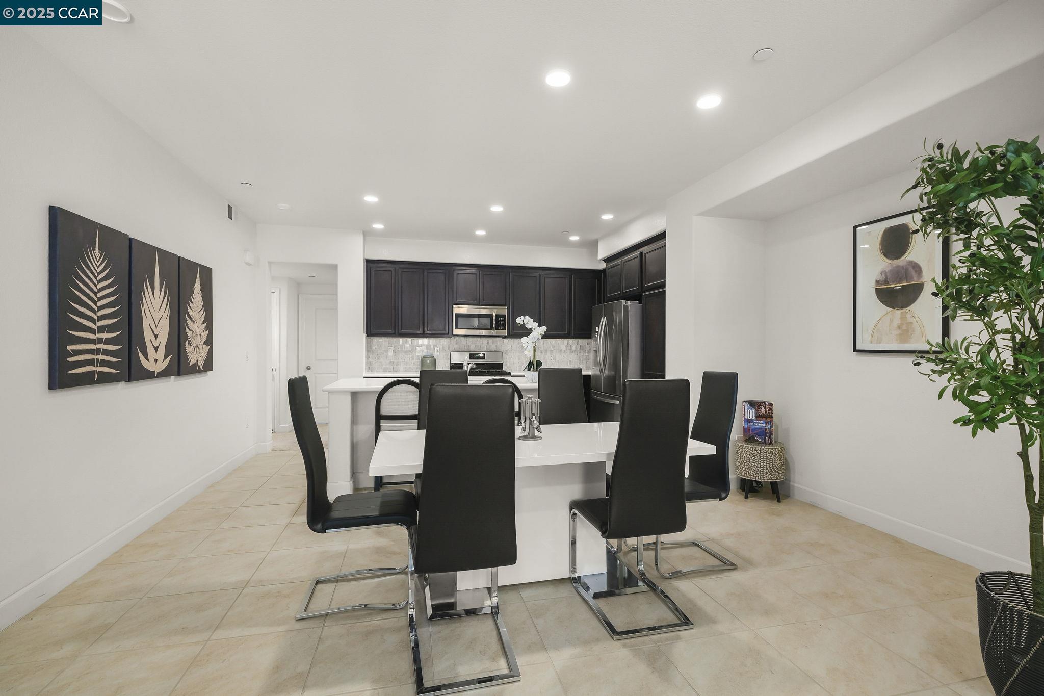 38976 Primula Terrace Newark, CA 94560 - Photo 8 of 29 a view of a dining room with furniture
