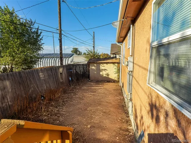 a view of balcony with wooden floor