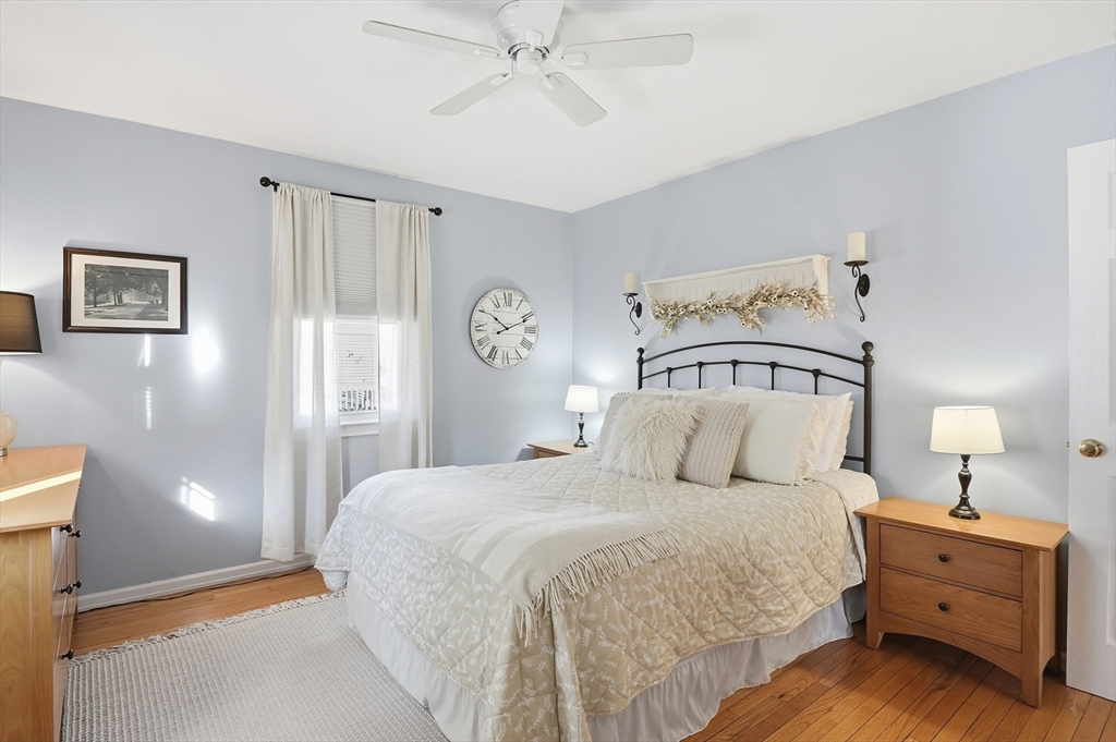 28 Sylvester Road Natick, MA 01760 - Photo 13 of 30 a bedroom with a bed and painting on the wall