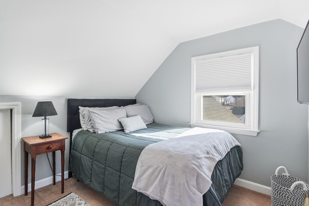 28 Sylvester Road Natick, MA 01760 - Photo 16 of 30 a bedroom with a bed and a window