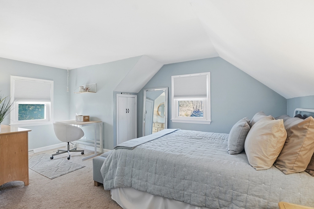 28 Sylvester Road Natick, MA 01760 - Photo 18 of 30 a bedroom with a bed and window