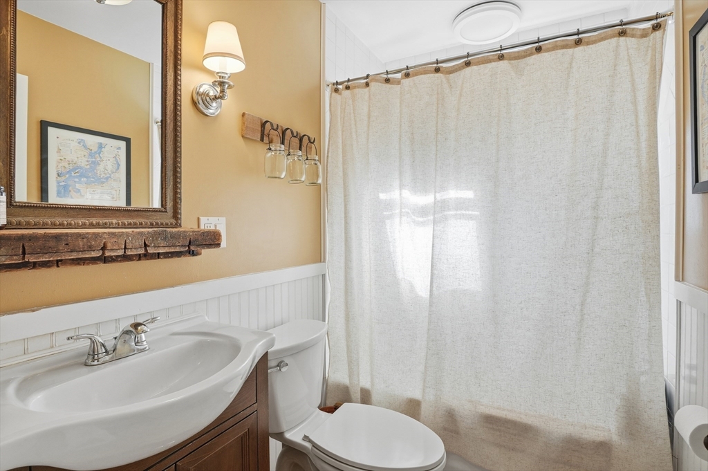 28 Sylvester Road Natick, MA 01760 - Photo 22 of 30 a bathroom with a sink toilet and shower