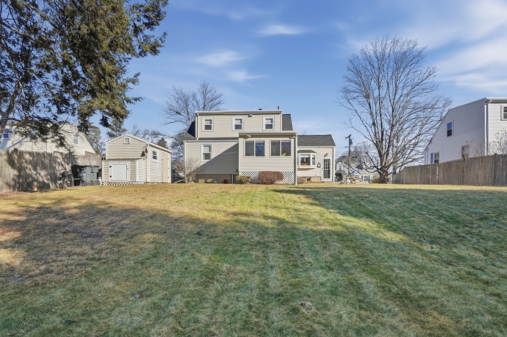 28 Sylvester Road Natick, MA 01760 - Photo 29 of 30 a front view of a house with a yard