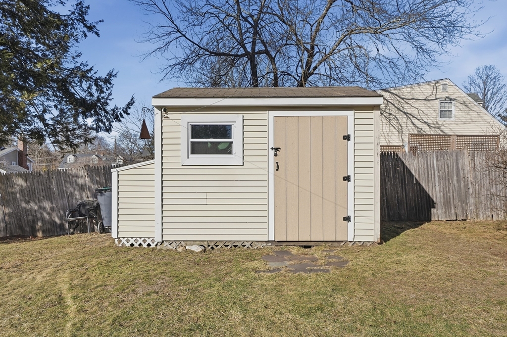 28 Sylvester Road Natick, MA 01760 - Photo 30 of 30 a view of a house with a backyard