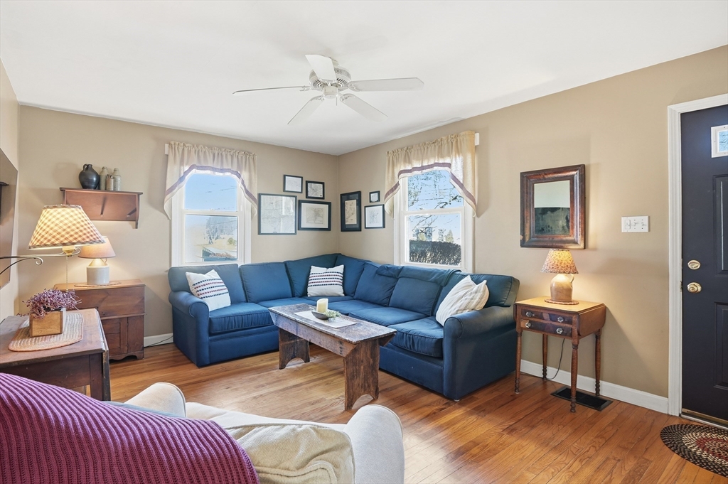 28 Sylvester Road Natick, MA 01760 - Photo 5 of 30 a living room with furniture and a wooden floor